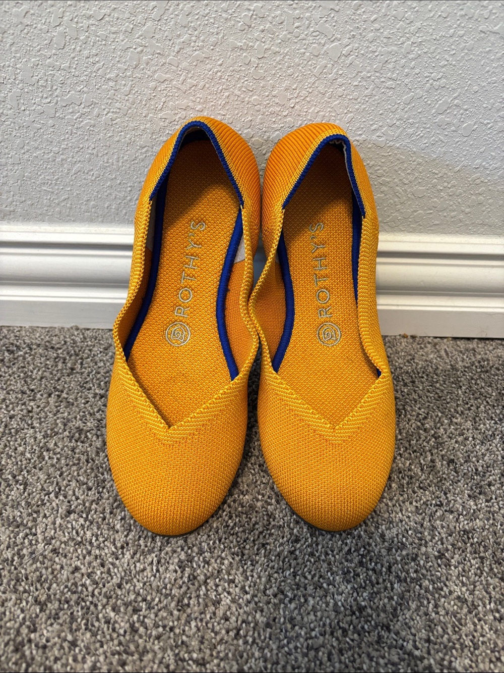 Rothy's Bright Yellow Flats with Blue Trim